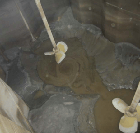 Sludge-settling-in-tank-PG-Flow-Solutions Sludge-settling-in-tank-PG-Flow-Solutions